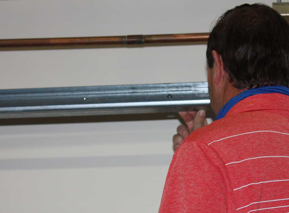 Inspect Commercial Door Track Alignment