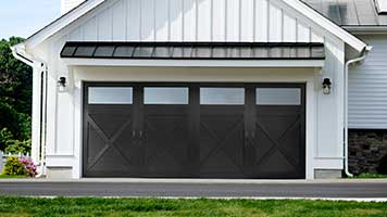 Amarr Unveils Bold Black Color Option for Carriage Court Overlay Doors